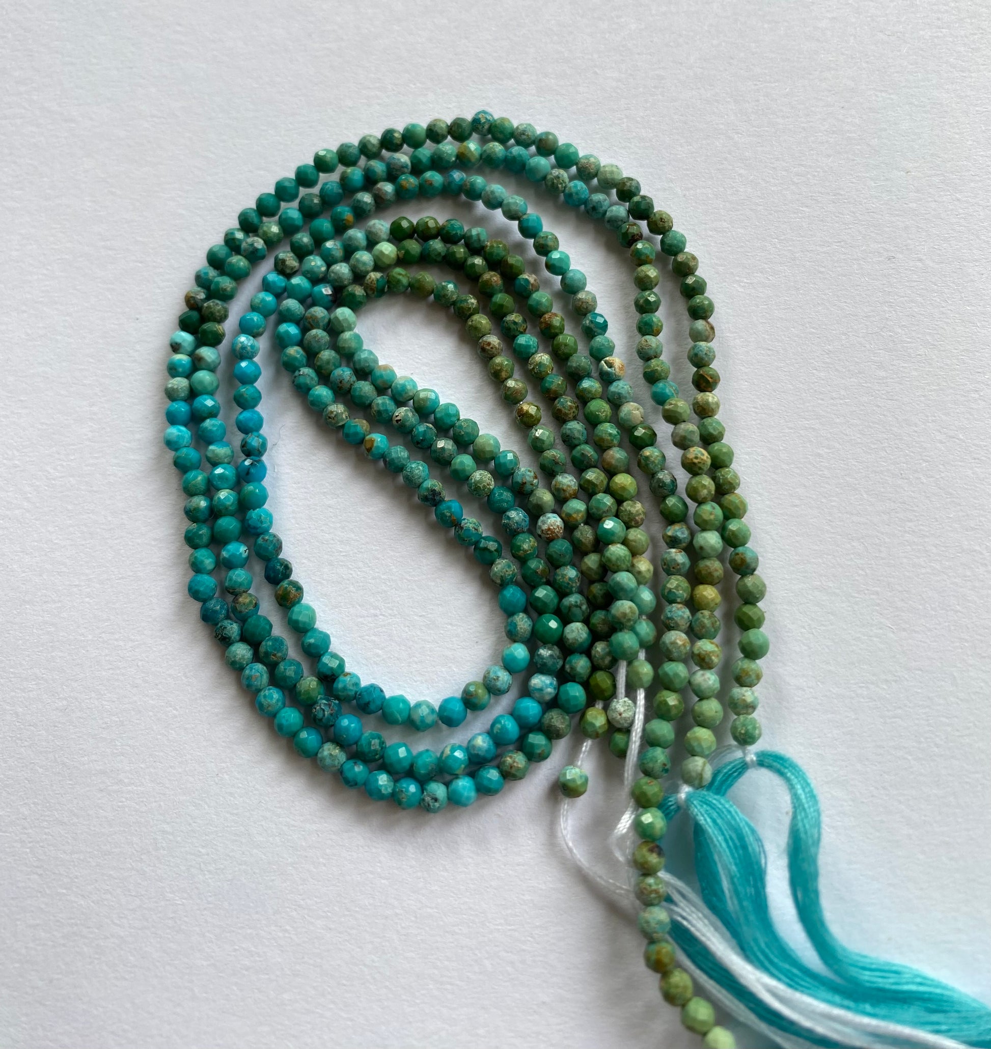 Stunning strand with 3mm Chrysocolla faceted rondelle beads, ideal for a stylish accessory.