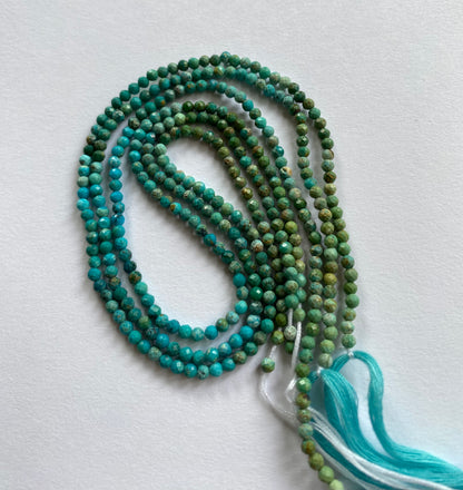 Stunning strand with 3mm Chrysocolla faceted rondelle beads, ideal for a stylish accessory.