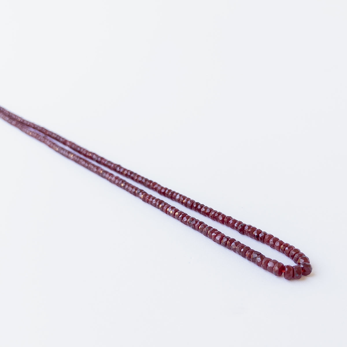 High‑quality dyed Ruby gemstone beads with brilliant faceting and rich red tones.