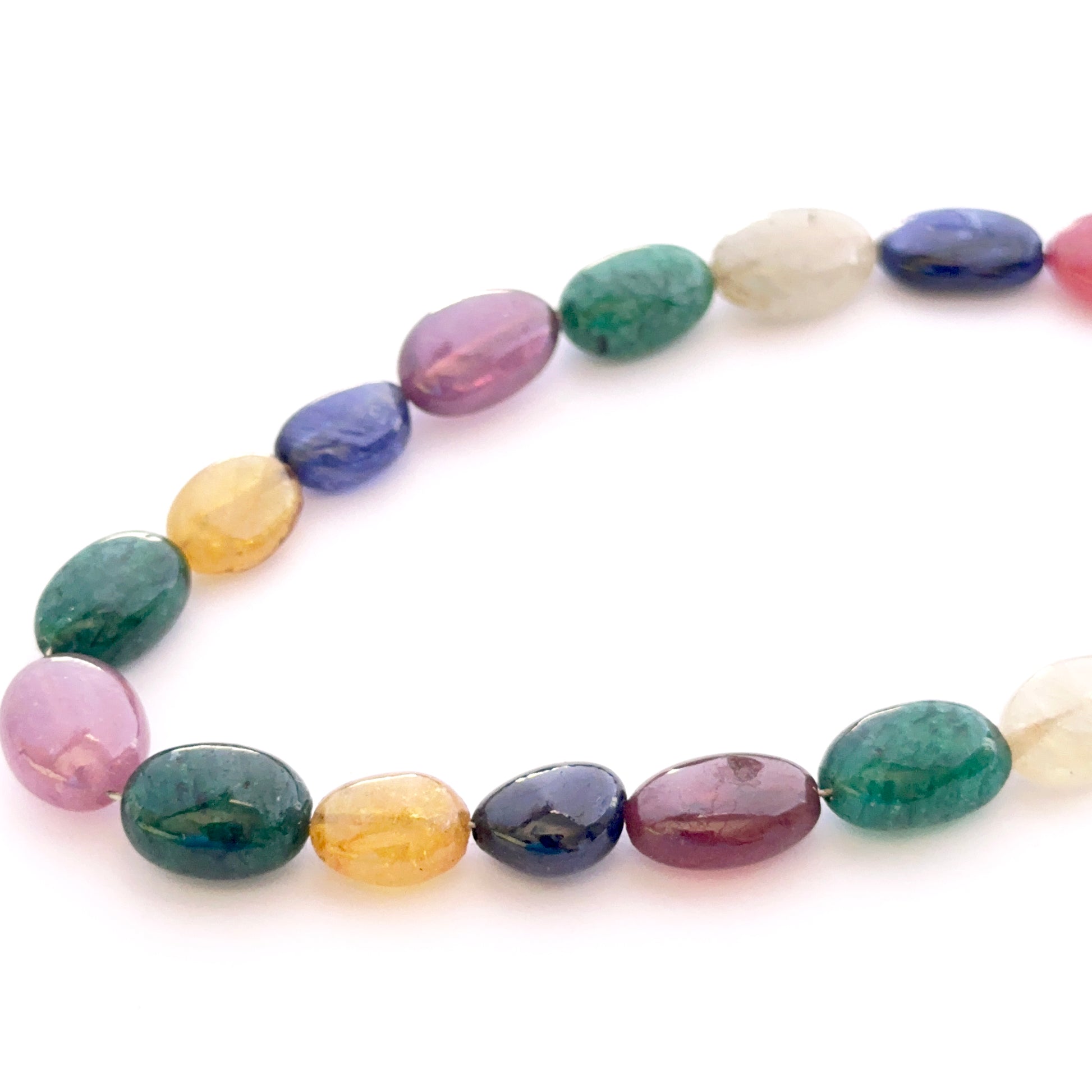 Set of 17 smooth oval multi stone beads 9x7–11x9mm totalling 81 carats, ideal for bespoke jewellery and settings.