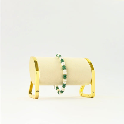 Elegant emerald and freshwater pearl bracelet crafted with smooth rondelle beads.