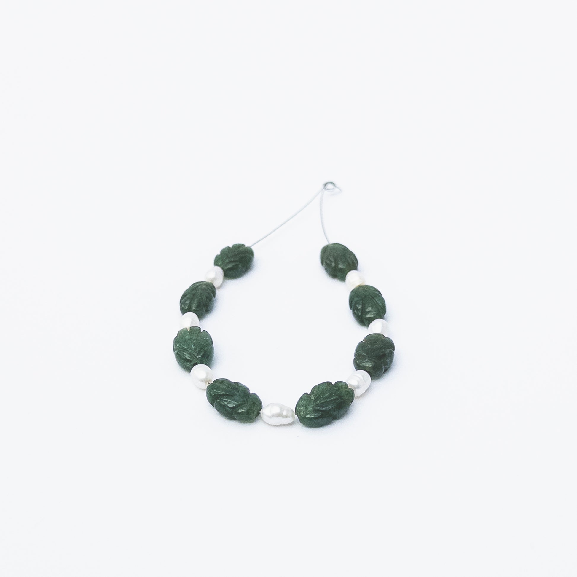 Genuine carved Emerald beads paired with Freshwater Pearls, ideal for handmade jewellery components and luxury designs.