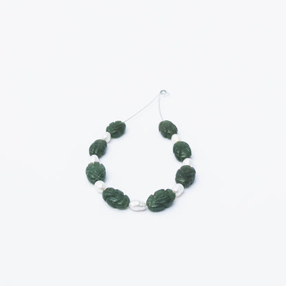 Genuine carved Emerald beads paired with Freshwater Pearls, ideal for handmade jewellery components and luxury designs.