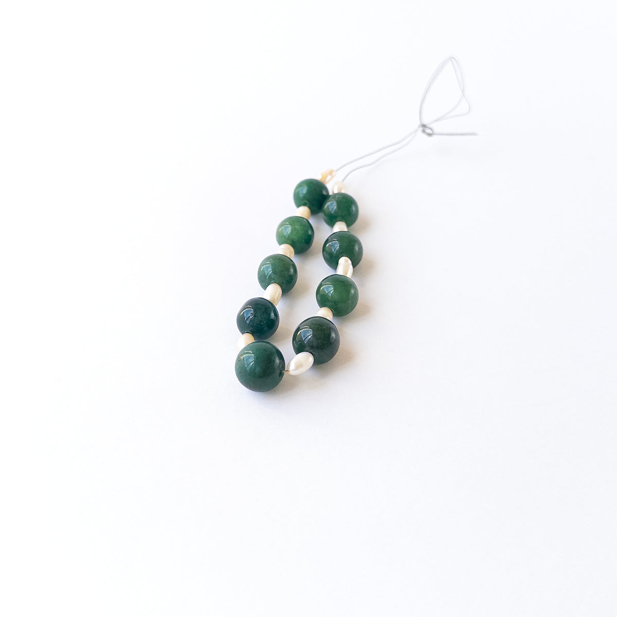 Natural Emerald gemstone beads with vibrant green colour and radiant Freshwater Pearls for premium stone bead designs.