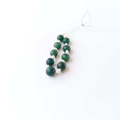 Natural Emerald gemstone beads with vibrant green colour and radiant Freshwater Pearls for premium stone bead designs.