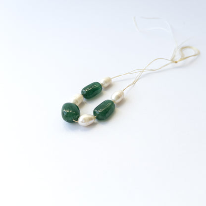 Natural Emerald and pearl beads with soft shine and smooth tumble shapes, ideal for artisan jewellery components.