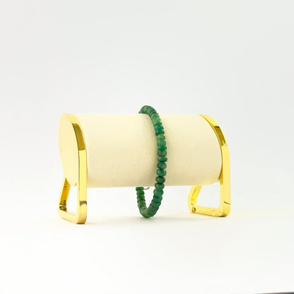 Emerald bracelet featuring smooth rondelle 5.2–6mm beads in a 20cm adjustable design.