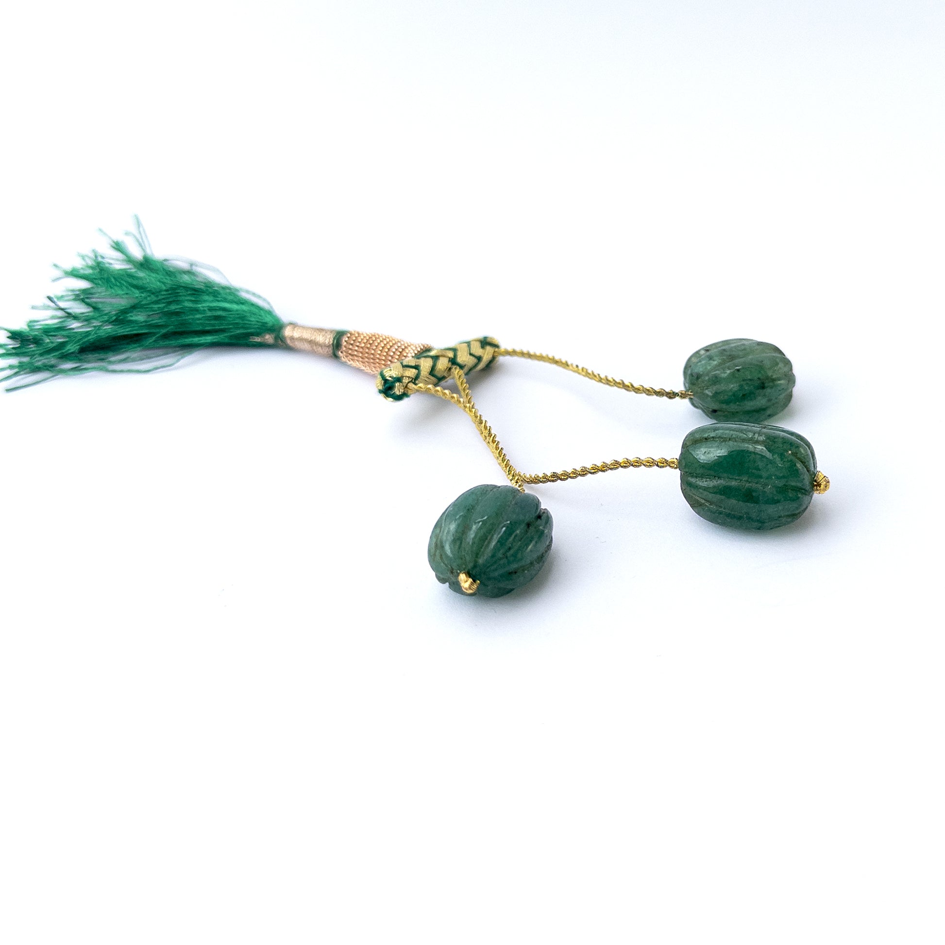 Natural Emerald stone beads with polished carved oval shapes, perfect for artisan jewellery components.