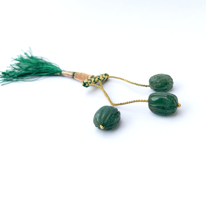 Natural Emerald stone beads with polished carved oval shapes, perfect for artisan jewellery components.