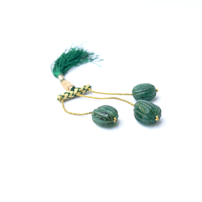 Genuine Emerald gemstone beads showcasing smooth carved oval cuts in mixed 13.6–14.6mm sizes.