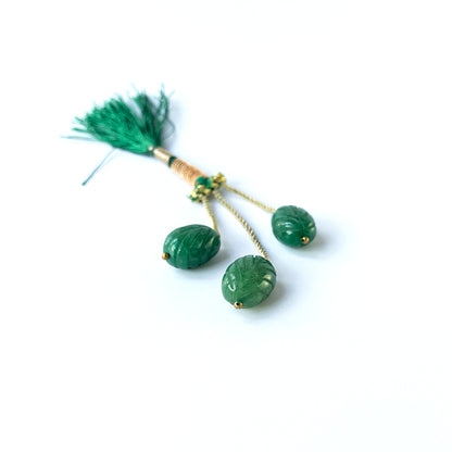 Genuine emerald stone beads with detailed carved oval shaping, ideal for artisan and handmade jewellery.