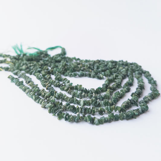 Authentic Shaded Emerald gemstone chips with rich green tones, ideal for DIY jewellery and beadwork.