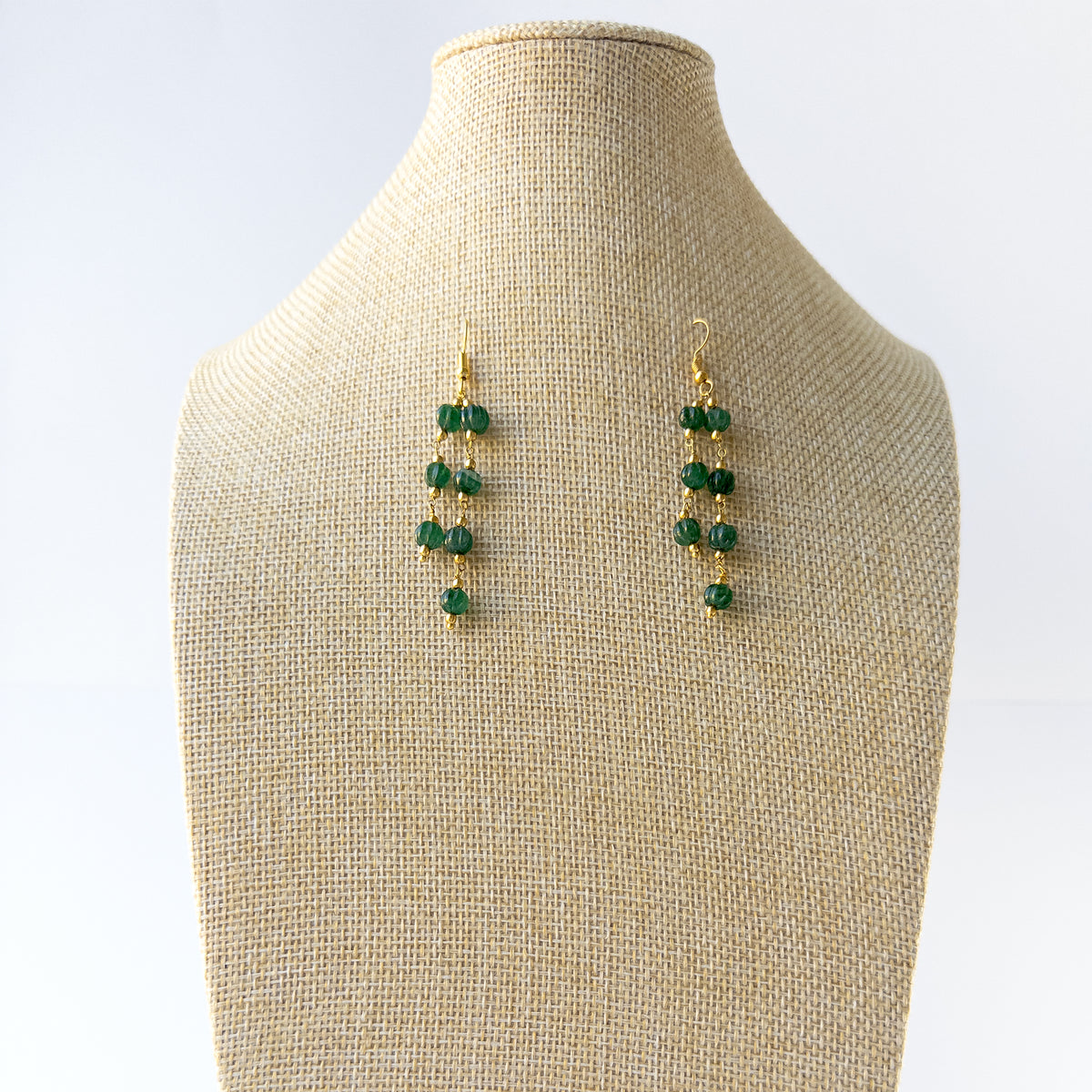 Handmade jewellery featuring Emerald pumpkin‑cut beads with consistent sizing and radiant shine.