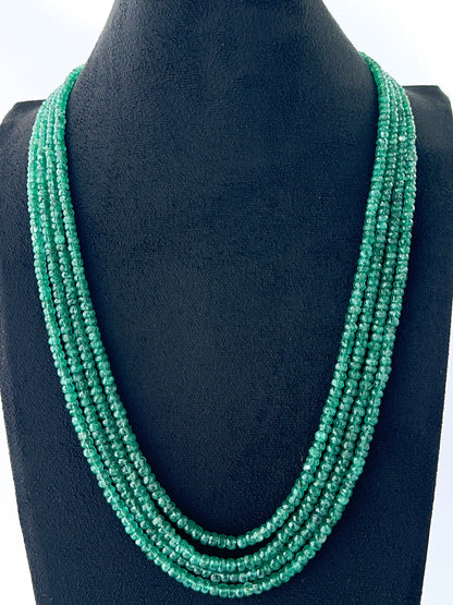 Four‑strand faceted rondelle emerald necklace with adjustable 47–52cm layering.