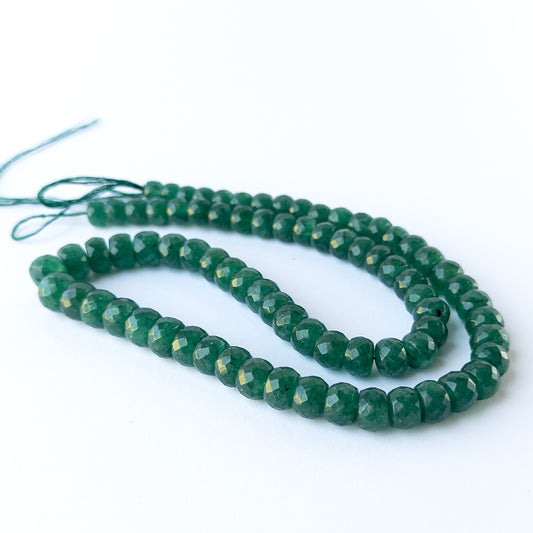 Handmade jewellery components featuring Emerald rondelles with consistent sizing and radiant shine.