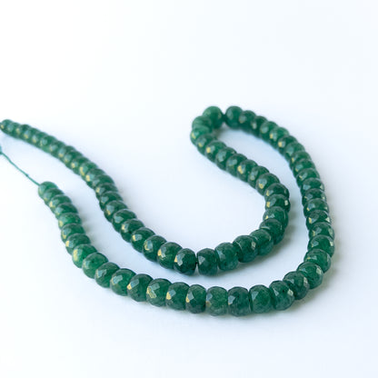 Authentic Emerald gemstone beads displaying crisp faceting, natural inclusions, and premium clarity for DIY jewellery makers.