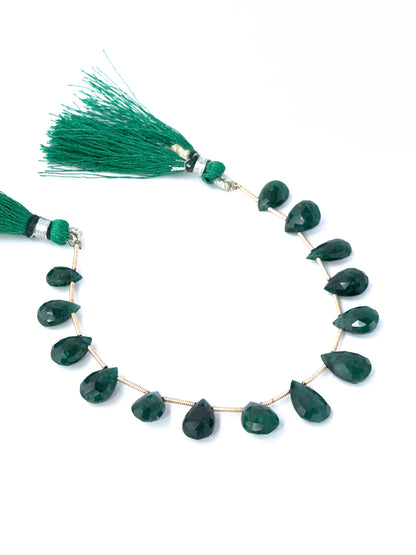 Emerald gemstone teardrops with rich green tones and hand‑selected quality.