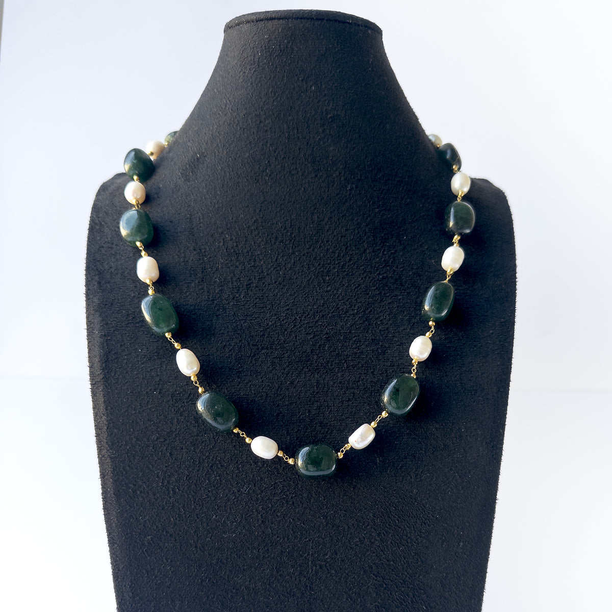 High‑quality smooth‑tumble Emerald beads arranged with radiant Pearls for an elegant handcrafted necklace and matching earrings.