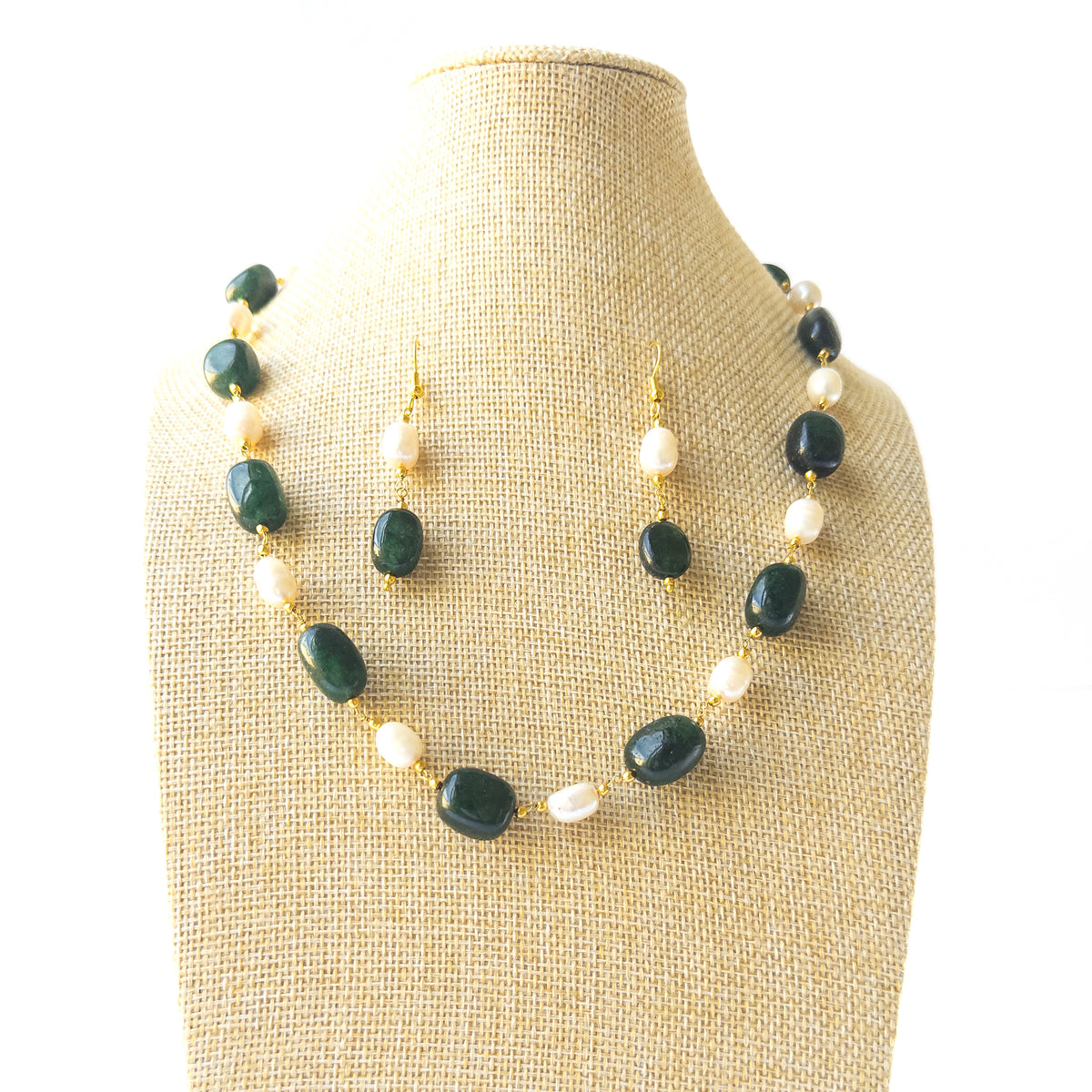 Emerald and Freshwater Pearl smooth‑tumble necklace set showing rich green tones and pearlescent shine in a 50cm design.