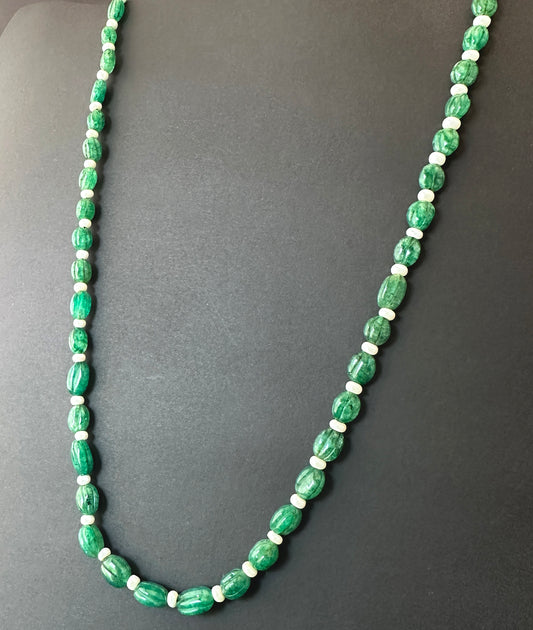 Emerald necklace with carved oval natural gemstone beads, 9–11mm x 6.5–8mm, polished shine and vivid green colour.
