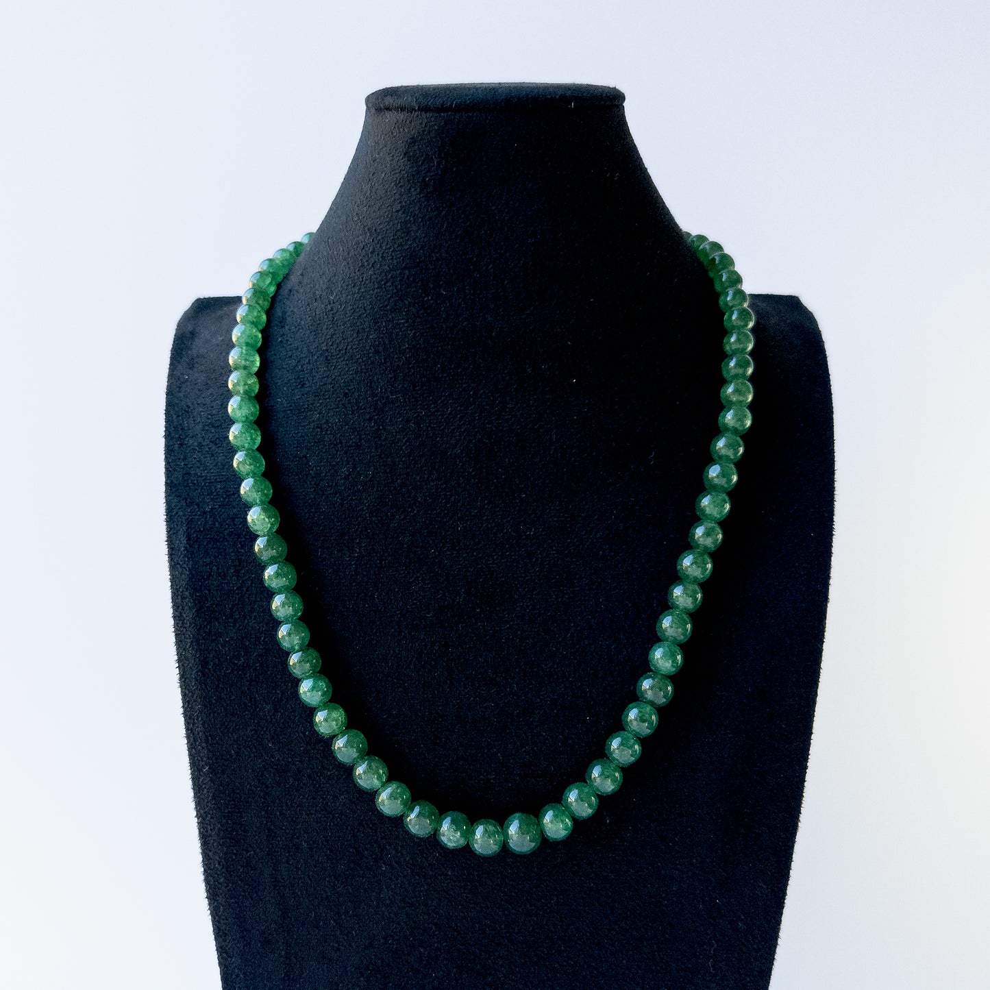 Authentic Emerald stone beads showcasing deep green tones and smooth round finish for jewellery designers.