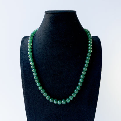 Authentic Emerald stone beads showcasing deep green tones and smooth round finish for jewellery designers.