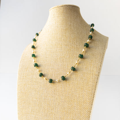 Genuine Emerald stone beads with carved pumpkin‑cut texture paired with lustrous Pearls in an elegant necklace.