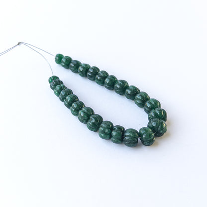Emerald pumpkin‑cut gemstone beads in 6.8–10mm sizes, showcasing rich green colour for handmade jewellery designs.