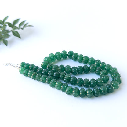 Natural Emerald gemstone beads with carved texture and bright sparkle for premium stone bead jewellery designs.