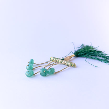 Authentic emerald stone beads in polished smooth rondelle cuts showing glossy shine for jewellery design work.