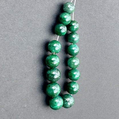Stone beads for DIY jewellery featuring smooth rondelle cut and vibrant colour ideal for elegant design projects.