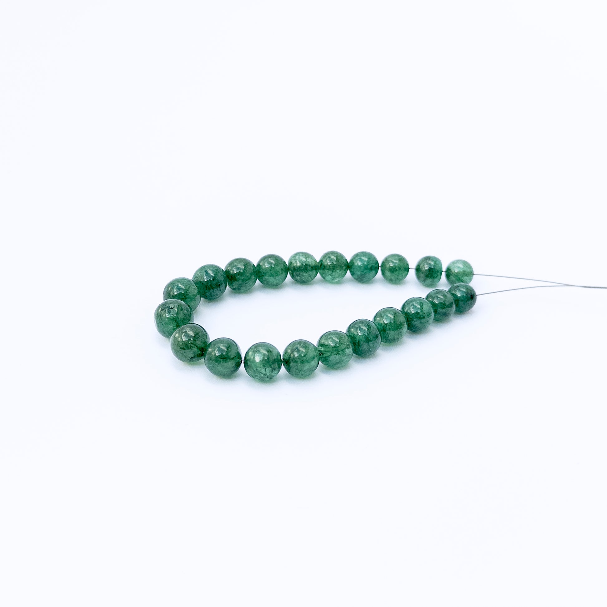 High‑quality Emerald stone beads in smooth round cut, perfect for elegant DIY jewellery designs.