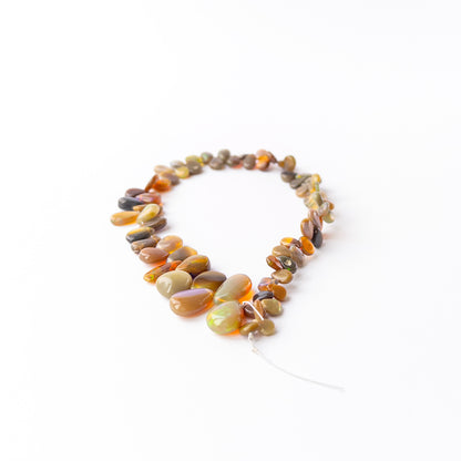Genuine Ethiopian Opal gemstone beads with smooth briolette shape perfect for artisan jewellery.