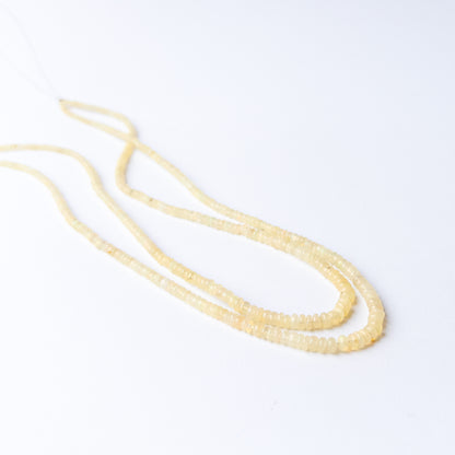 Genuine Ethiopian Opal gemstone beads showcasing polished shine and natural fire.