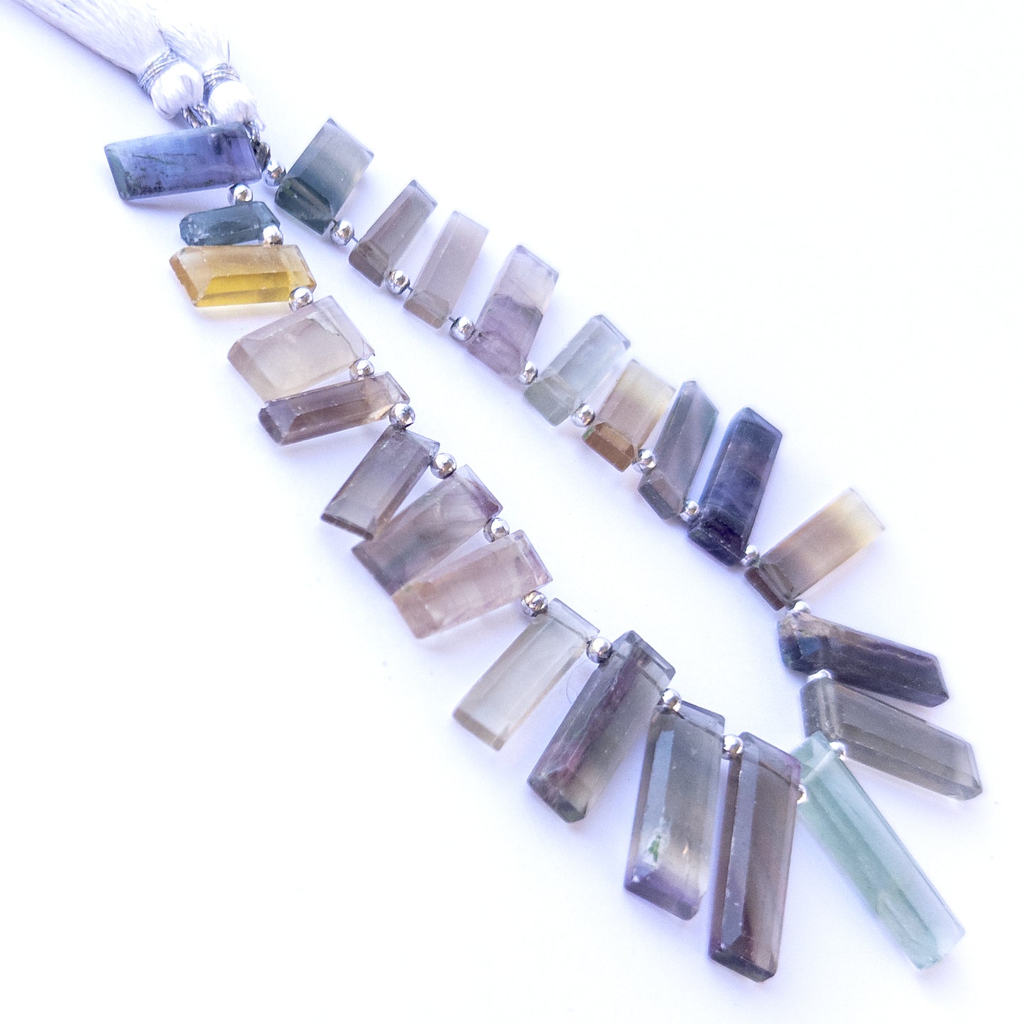 Premium fluorite gemstone beads for DIY jewellery, displaying faceted rectangle cuts and striking multicolour patterns.