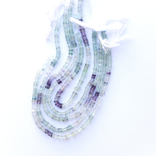 Genuine stone beads in mixed green and purple hues, featuring smooth wheels for DIY jewellery making.