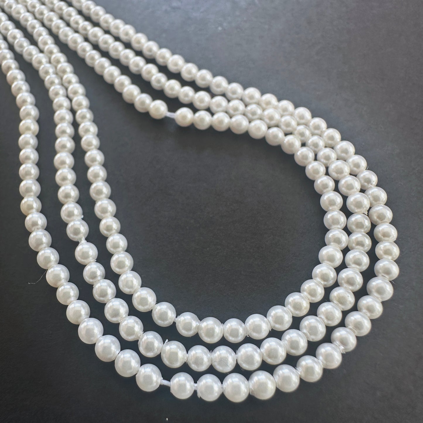Handmade jewellery components featuring 2.6-2.7mm Freshwater Pearl beads.