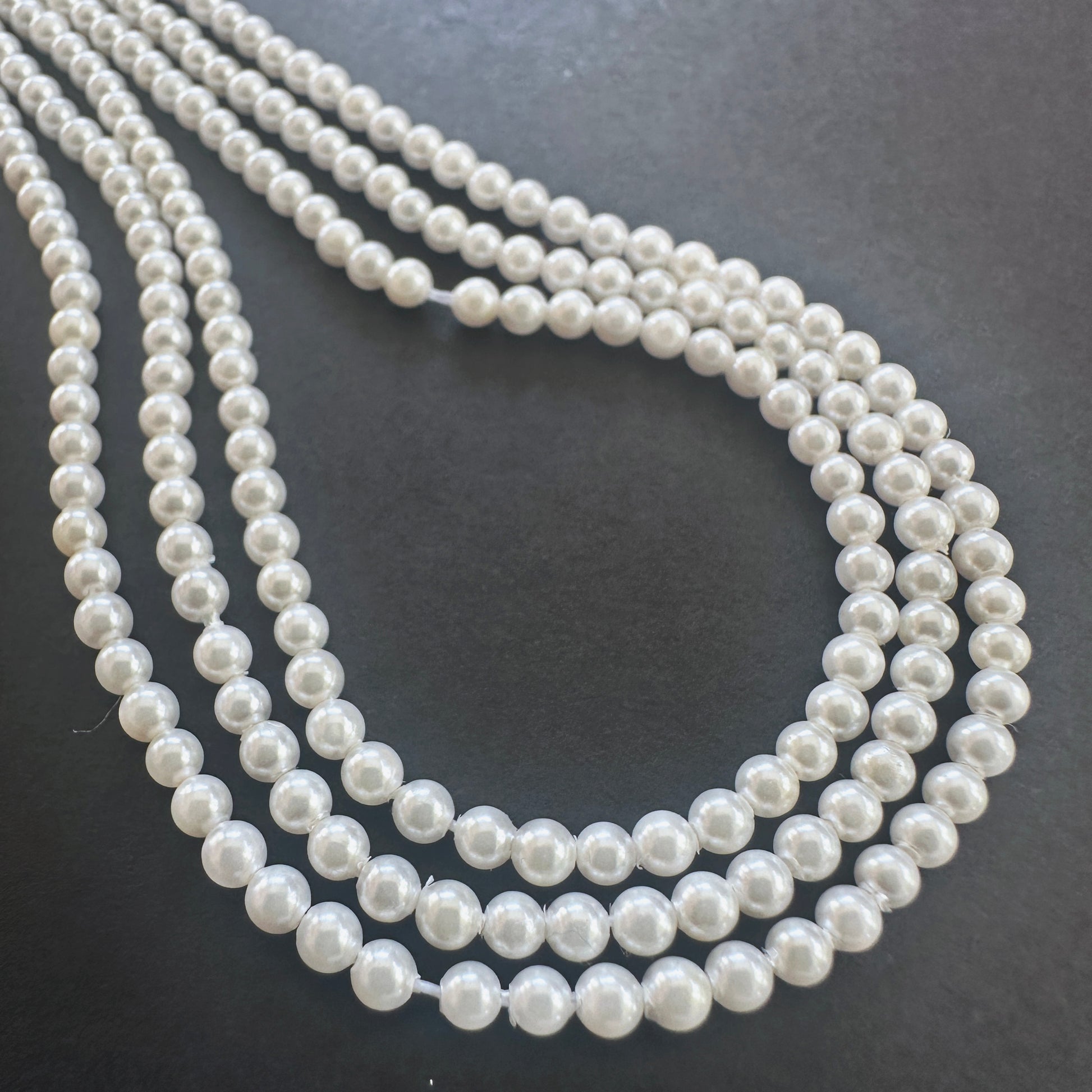 Handmade jewellery components featuring 2.6-2.7mm Freshwater Pearl beads.