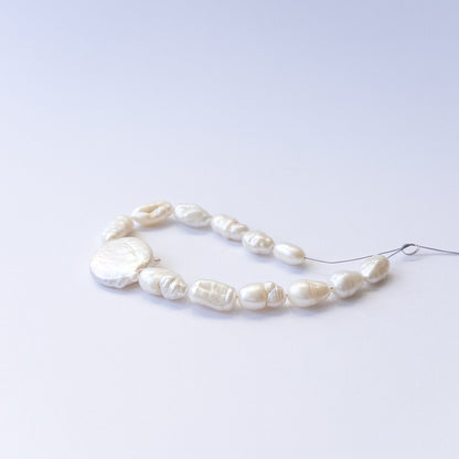 Genuine freshwater pearl beads showcasing mixed 6–9mm baroque shapes in 13‑piece sets.