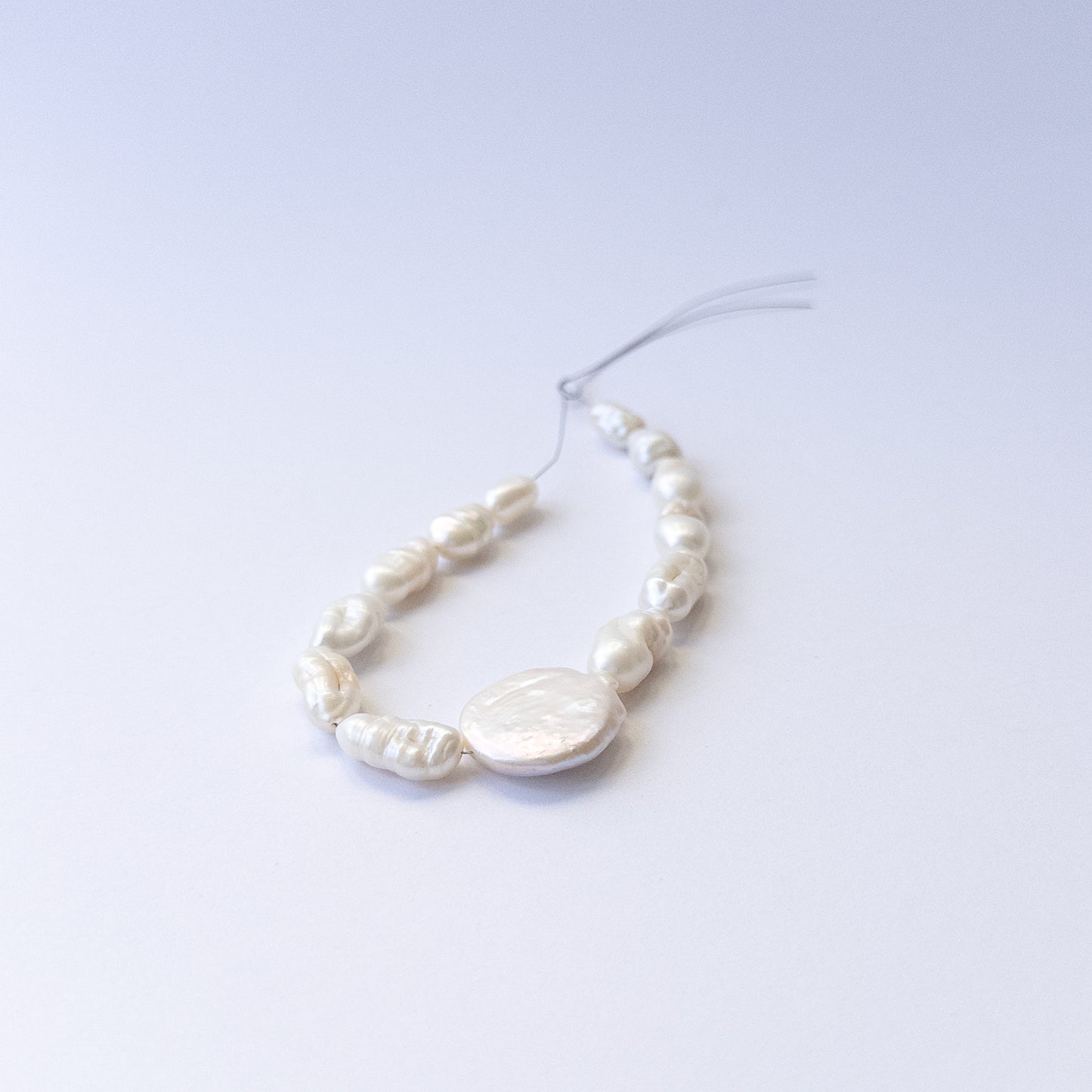 Handmade jewellery components using premium baroque freshwater pearls with soft lustre and texture.