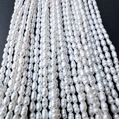Natural pearls in baroque rice shape, 3.1-3.3mm size, ideal for elegant DIY jewellery designs.