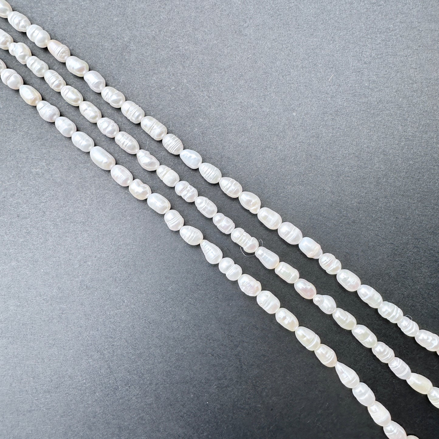 Pearls with organic baroque rice shape for handmade jewellery components.