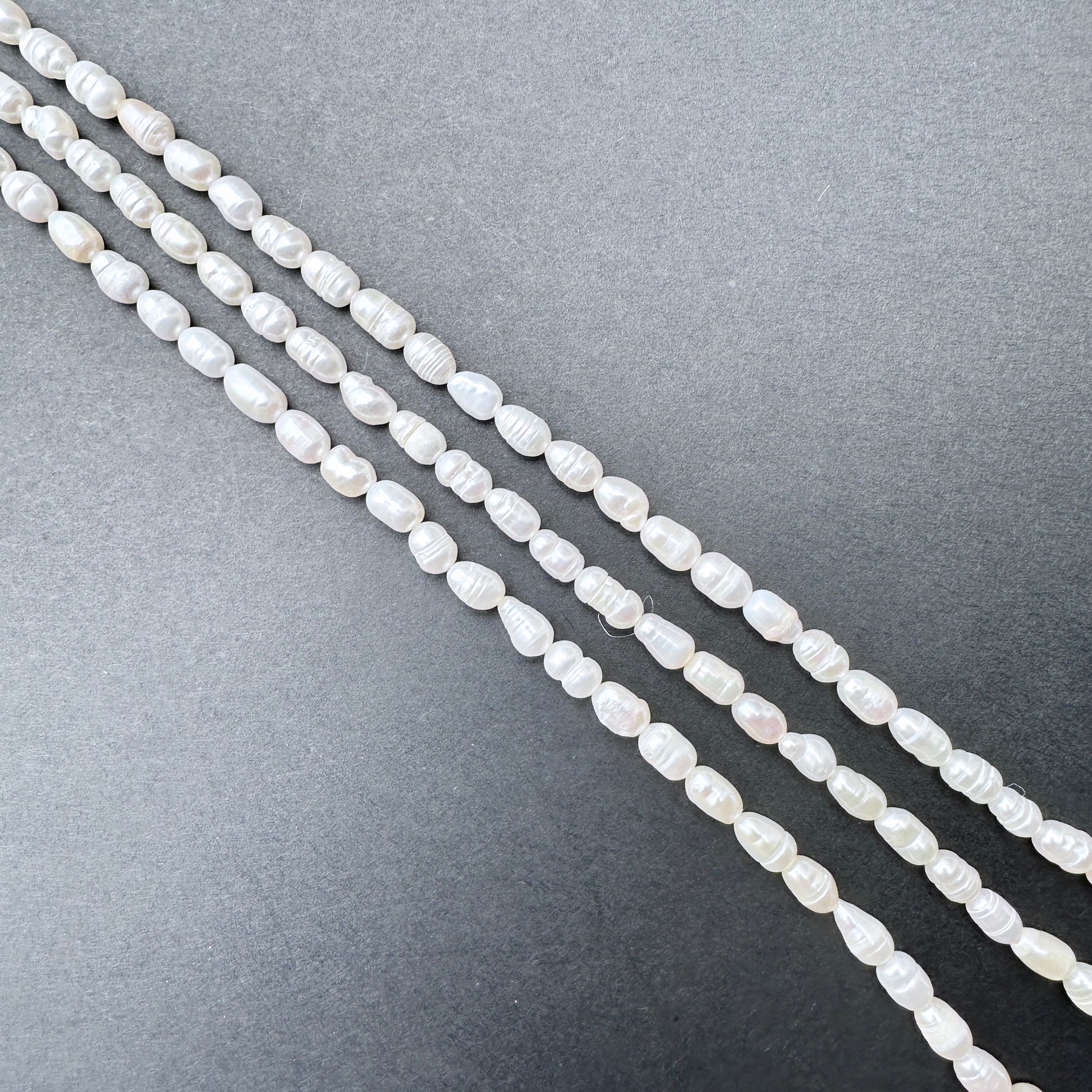 Pearls with organic baroque rice shape for handmade jewellery components.