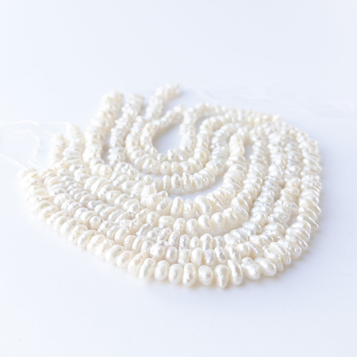 Authentic Freshwater Pearl gemstone beads ideal for handmade jewellery components and elegant designs.