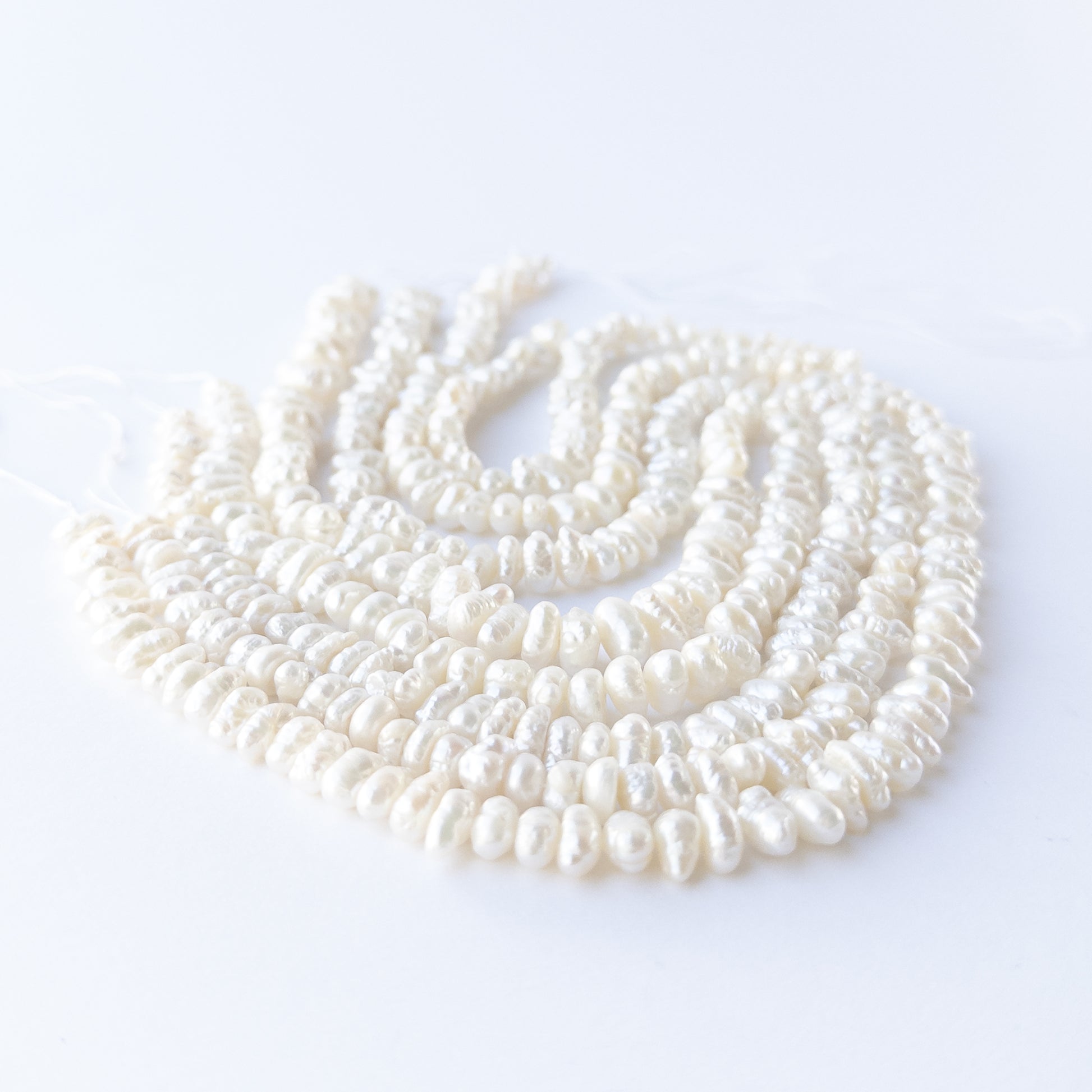 Authentic Freshwater Pearl gemstone beads ideal for handmade jewellery components and elegant designs.