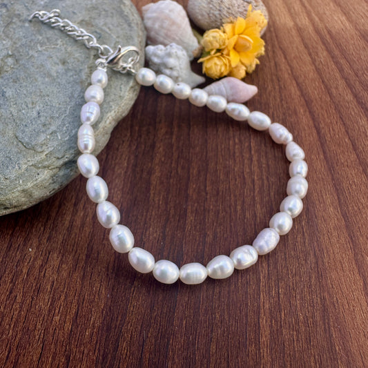 Freshwater Pearl bracelet with soft glow and adjustable length for versatile styling.