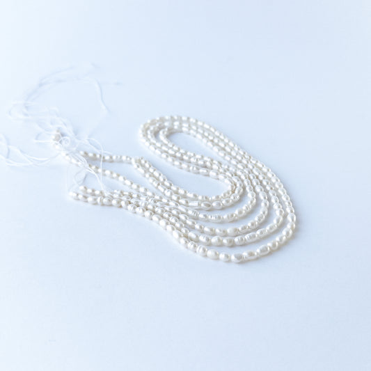 Freshwater Pearl fancy oval beads with elegant shine, perfect for DIY jewellery makers using authentic gemstone beads.