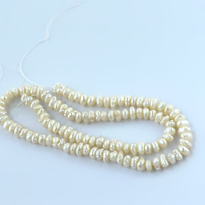 Natural Freshwater Pearl baroque beads showing soft lustre and organic shapes.
