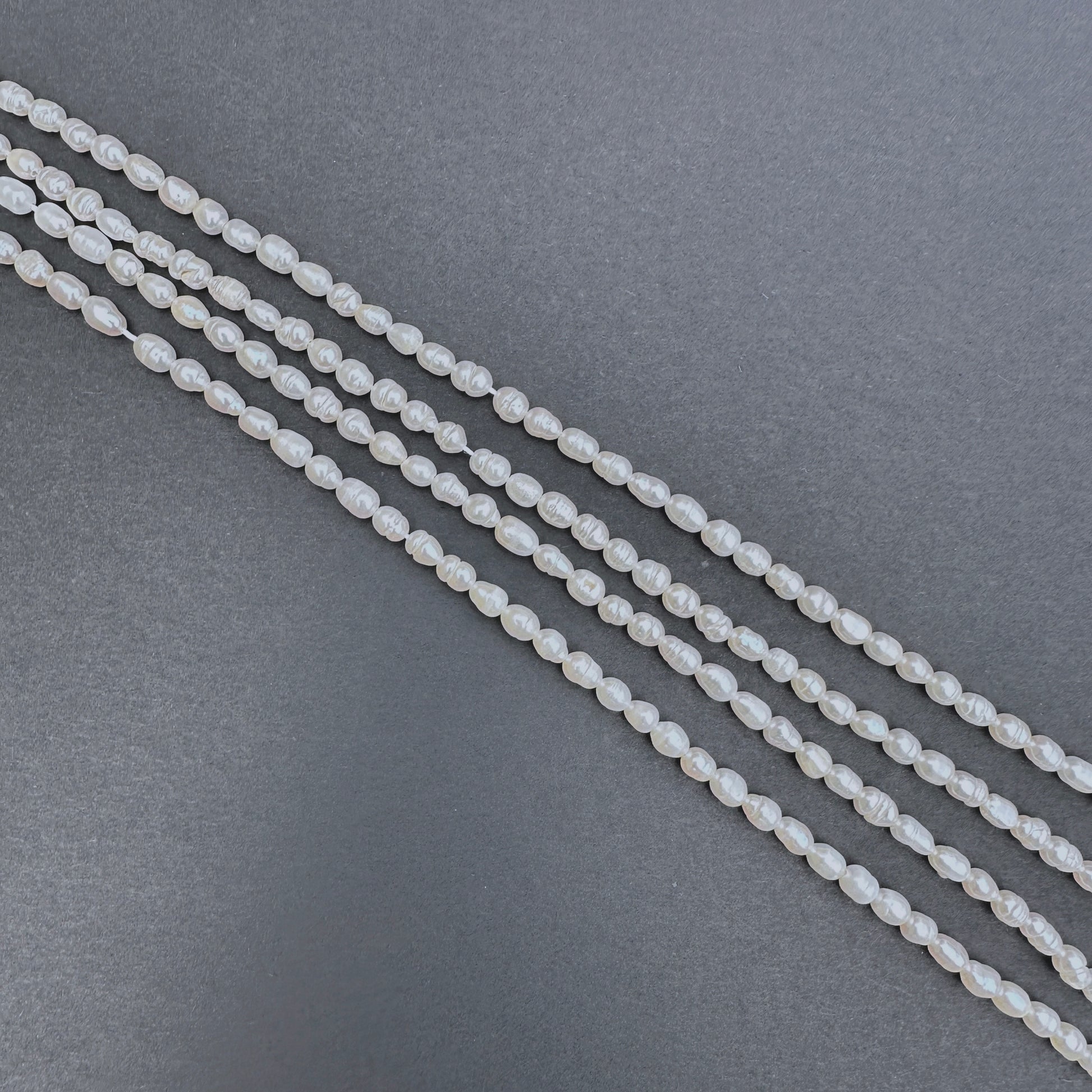 Handmade jewellery components featuring 3.9-4.3mm Freshwater Pearl stone beads.