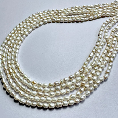 Freshwater rice pearls in 3mm size, arranged on a 35cm strand with soft ivory colour and smooth surface.